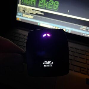 Black Electronic Device with Purple Lights